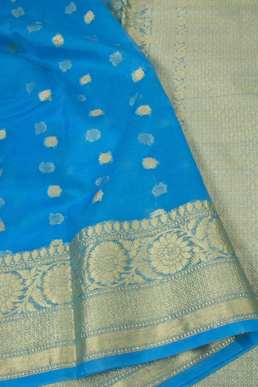 Mehendi Green Traditional Silk Saree With Copper Sulphate Blue Blouse &  Buttas Pattern - Sri Arya Silks